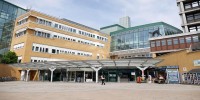 Office buildings with large paved area in front of them